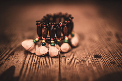 KENARI BRACELET SONIC ENERGY, 9.40CM x 6.09CM, COQUES DE NOIX DE KENARI, SON PRECIS