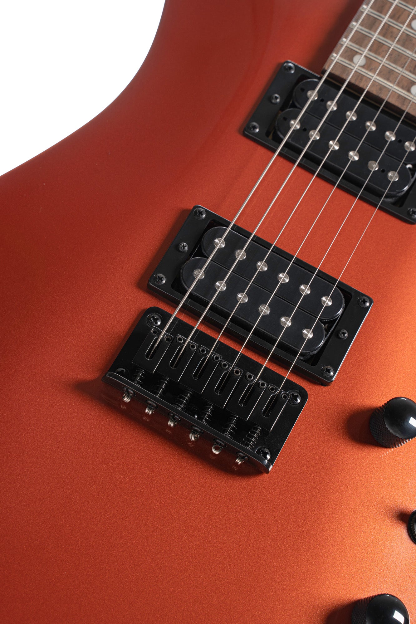 KX100, corps tilleul, manche vissé érable, touche jatoba, 2 micros doubles Powersound, iron oxide