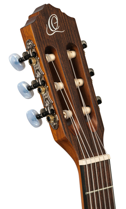 RCE125-34, corps Thinline, pan coupé, EQ Magus X/G, table épicéa, f/e acajou, sillet 45 mm, housse, naturel satiné